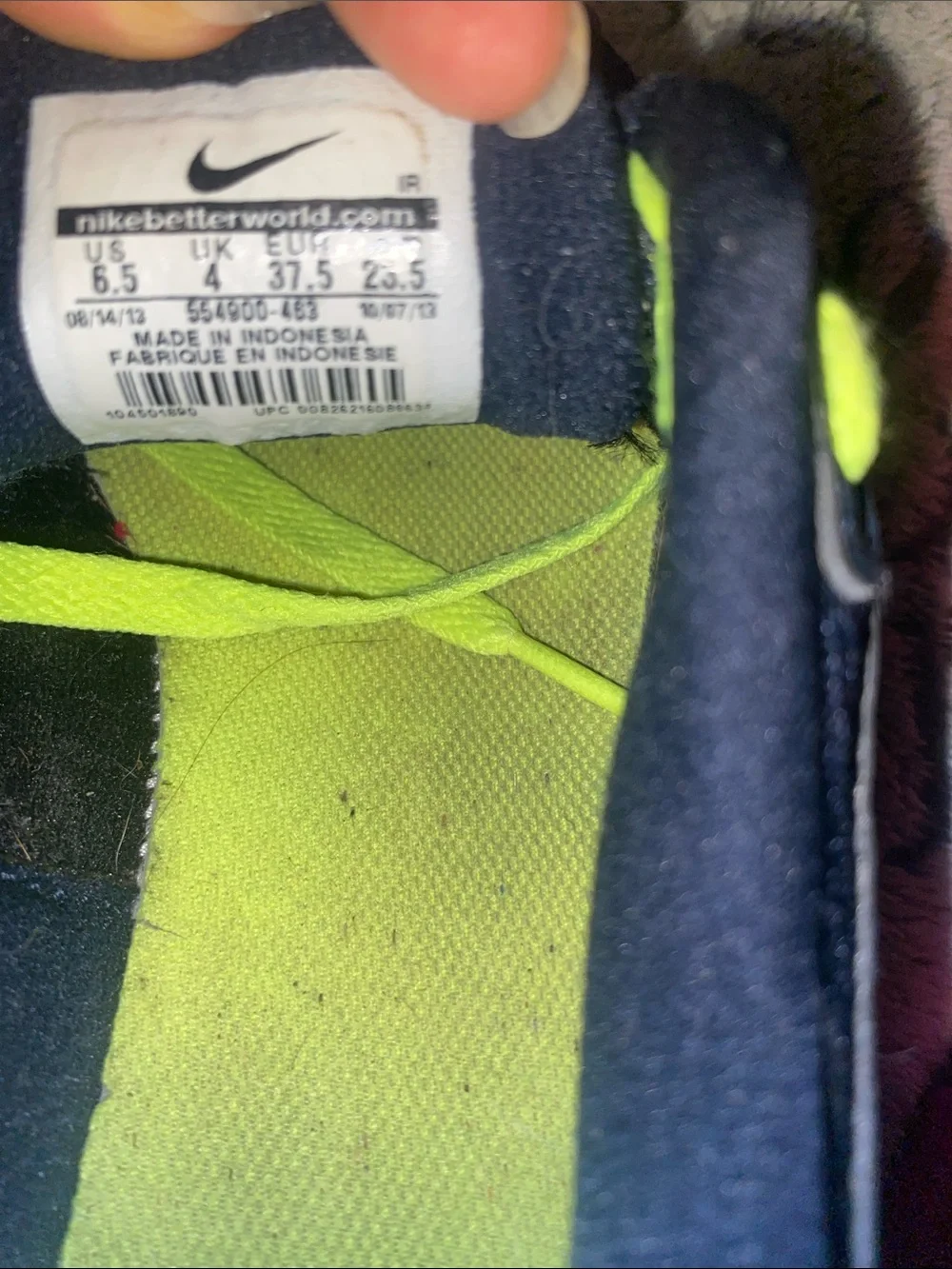 Nike women’s Navy Sneakers with Neon Green Laces and Pink Accents